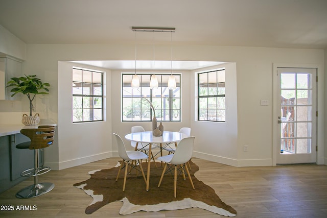 6608 E Ranch Rd, Cave Creek, AZ 85331 - dining room featuring light wood-style flooring and healthy amount of natural light