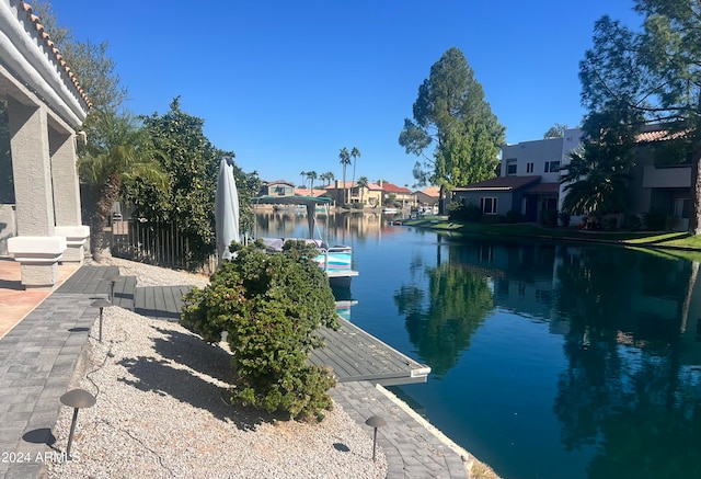 view of water feature with a boat dock