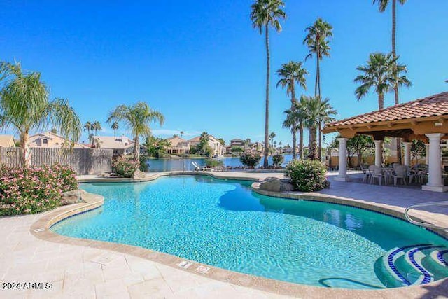 view of swimming pool featuring a patio area