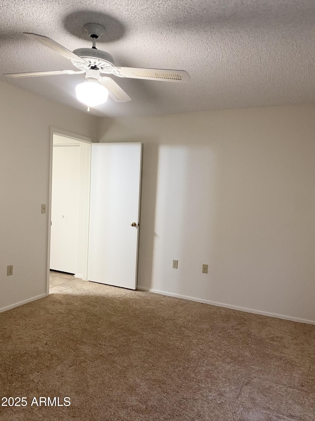 1249 E Commerce Ave, Gilbert, AZ 85234 - unfurnished room with light carpet, a textured ceiling, and a ceiling fan