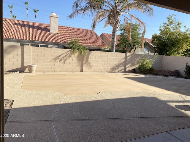 1249 E Commerce Ave, Gilbert, AZ 85234 - fenced backyard featuring a patio area