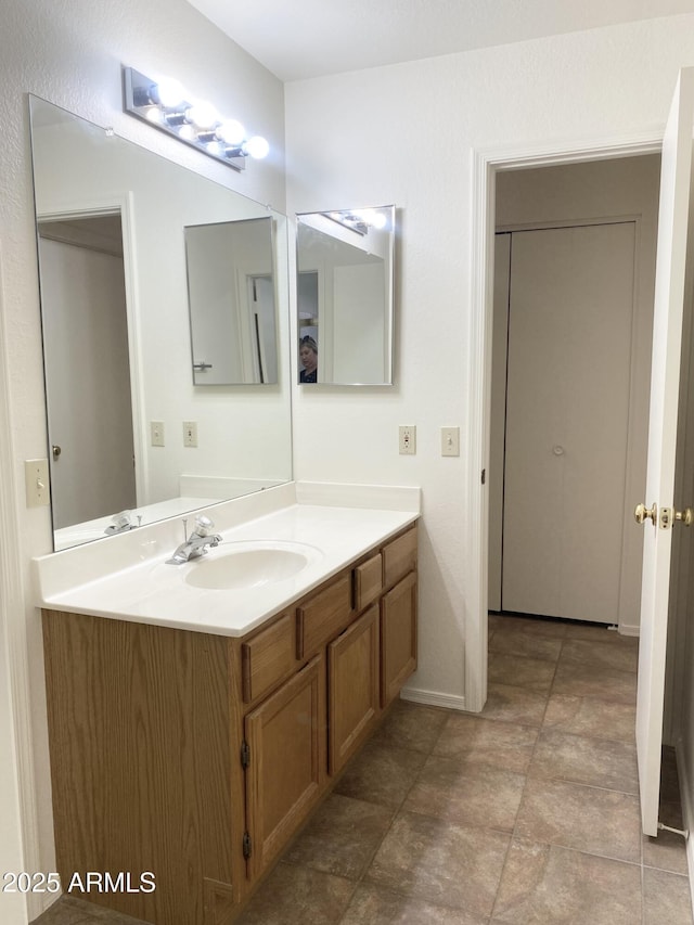 1249 E Commerce Ave, Gilbert, AZ 85234 - bathroom featuring vanity and baseboards