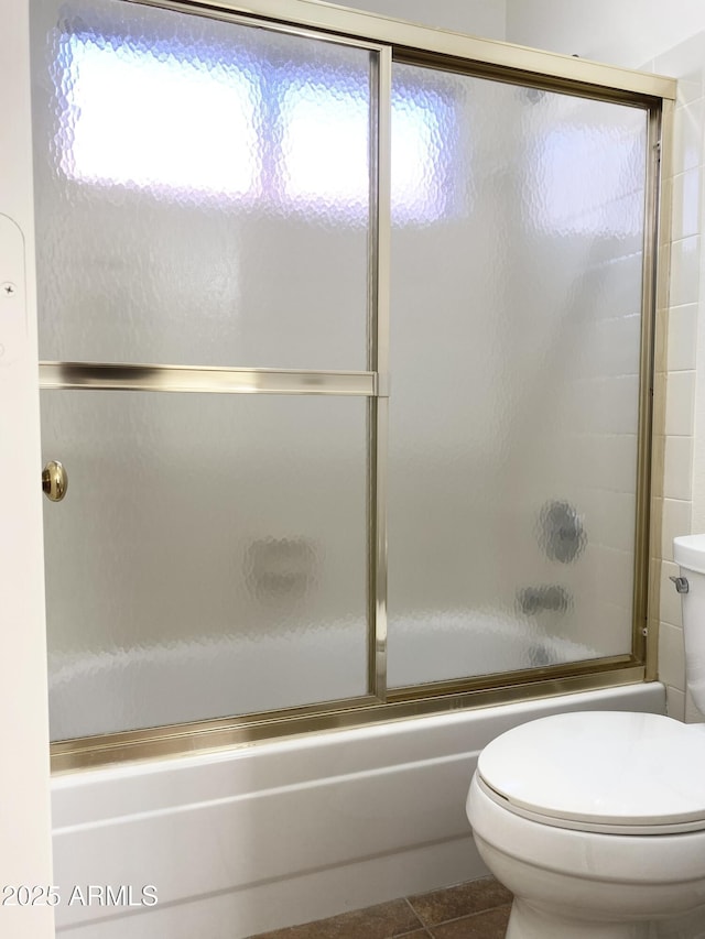 1249 E Commerce Ave, Gilbert, AZ 85234 - full bath with bath / shower combo with glass door and tile patterned floors