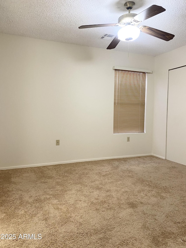 1249 E Commerce Ave, Gilbert, AZ 85234 - carpeted spare room with a textured ceiling and ceiling fan