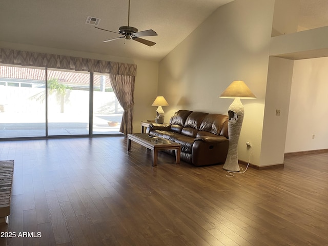 1249 E Commerce Ave, Gilbert, AZ 85234 - living room featuring lofted ceiling, a ceiling fan, and dark wood-style floors