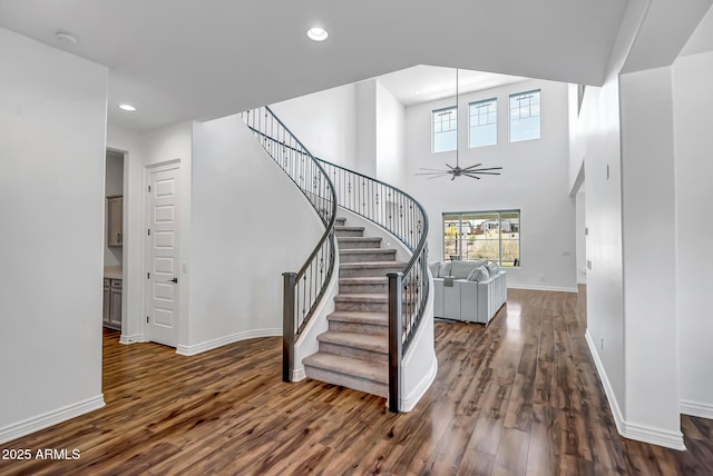 32083 N 126th Ave, Peoria, AZ 85383 - stairs featuring wood finished floors, baseboards, recessed lighting, and ceiling fan