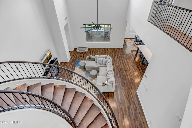 32083 N 126th Ave, Peoria, AZ 85383 - stairway featuring a high ceiling, wood finished floors, baseboards, and ceiling fan