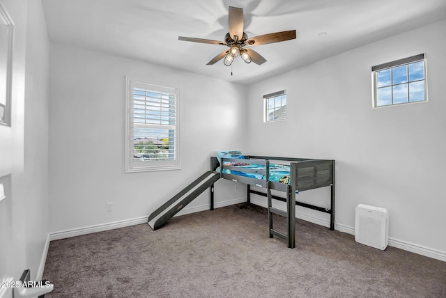 32083 N 126th Ave, Peoria, AZ 85383 - unfurnished bedroom with multiple windows, carpet, and baseboards