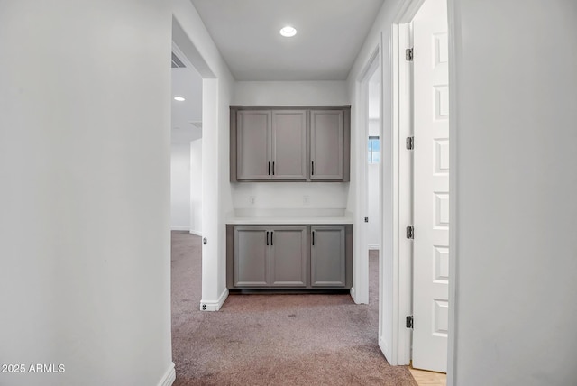32083 N 126th Ave, Peoria, AZ 85383 - hallway featuring light carpet, baseboards, and recessed lighting