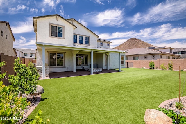 32083 N 126th Ave, Peoria, AZ 85383 - back of property with stucco siding and a patio area