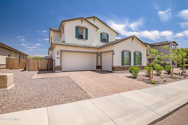 32083 N 126th Ave, Peoria, AZ 85383 - traditional-style home with a gate, stucco siding, decorative driveway, and an attached garage