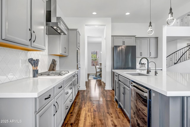 32083 N 126th Ave, Peoria, AZ 85383 - kitchen with gray cabinets, wall chimney range hood, stainless steel appliances, dark wood-style flooring, and recessed lighting