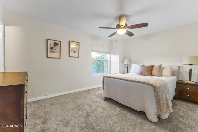 bedroom featuring ceiling fan and light colored carpet