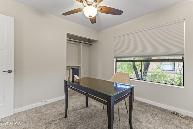 home office with vaulted ceiling, carpet flooring, and ceiling fan