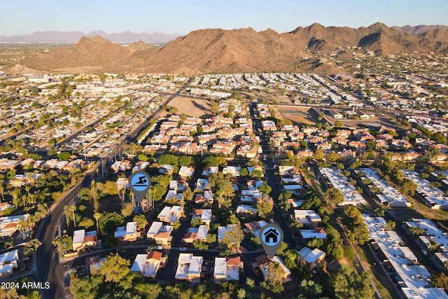 drone / aerial view featuring a mountain view