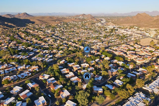 drone / aerial view featuring a mountain view