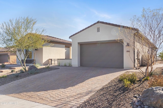 view of front of property with a garage