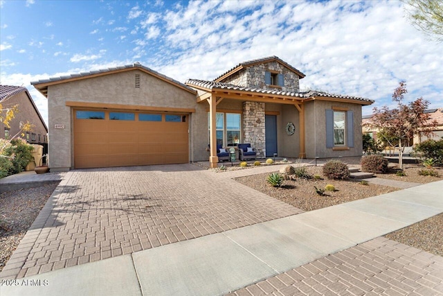 view of front of property with a garage