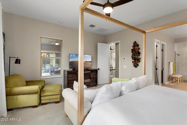 bedroom featuring ceiling fan and light carpet