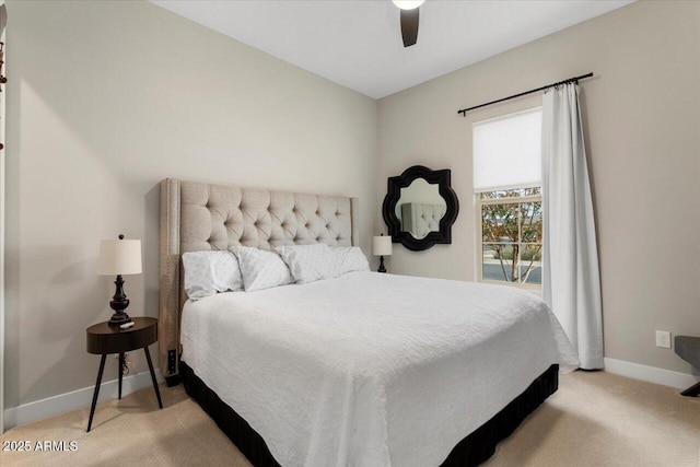 bedroom with ceiling fan and light colored carpet