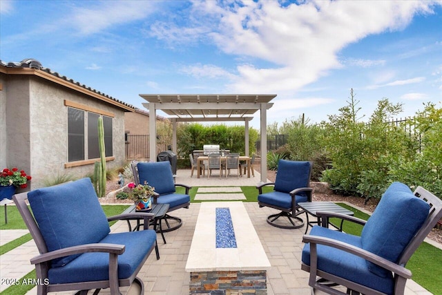 view of patio / terrace with a pergola and a fire pit