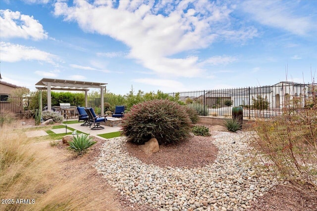 view of yard featuring an outdoor fire pit, a pergola, and a patio