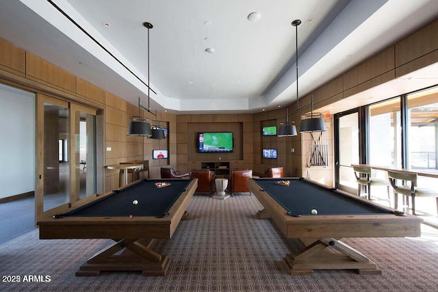 game room featuring dark colored carpet, french doors, a tray ceiling, and billiards