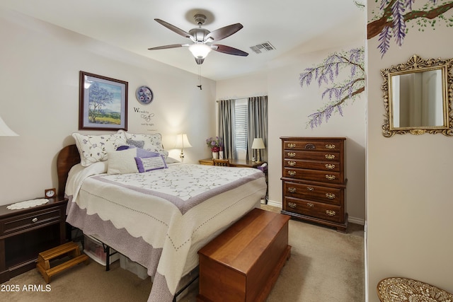 bedroom featuring ceiling fan and light colored carpet