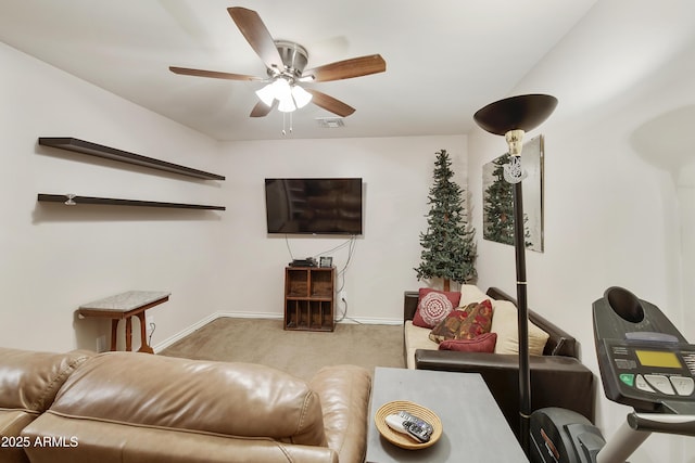 living room with ceiling fan and light colored carpet