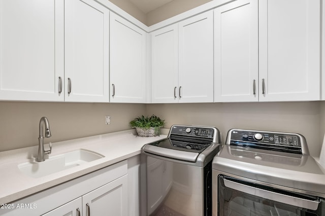 14507 N Valencia Dr, Fountain Hills, AZ 85268 - laundry area with washer and dryer and cabinet space