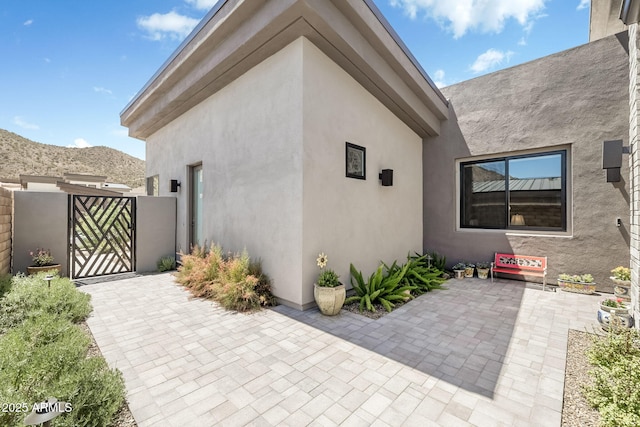 14507 N Valencia Dr, Fountain Hills, AZ 85268 - view of patio / terrace with a gate and a mountain view