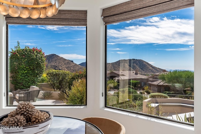 interior space with a mountain view and a wealth of natural light