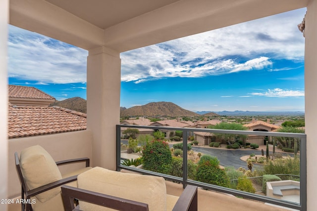 balcony featuring a mountain view