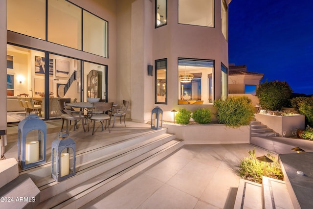 view of patio at twilight