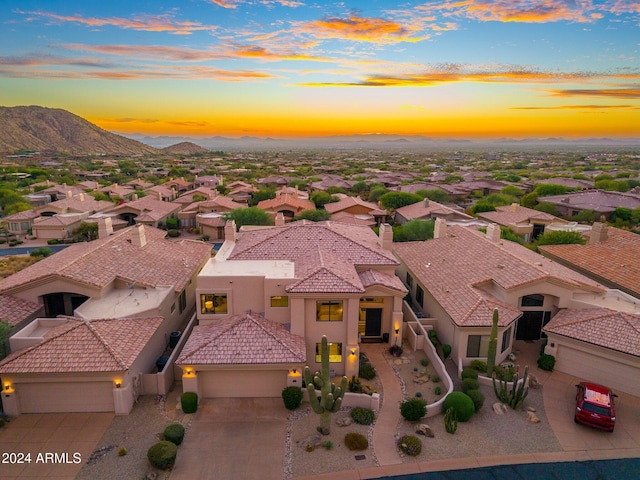 aerial view at dusk with a mountain view