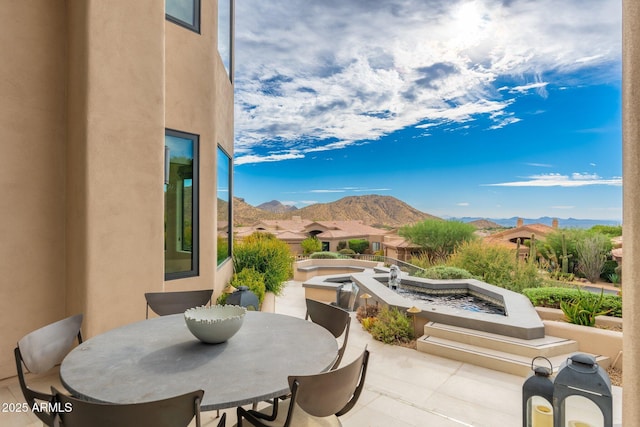 view of patio featuring a mountain view