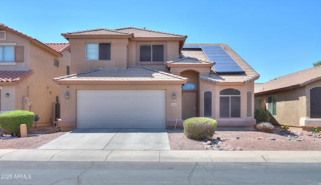 view of front facade with solar panels