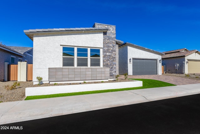 view of front of home with a garage