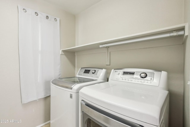 laundry area featuring separate washer and dryer