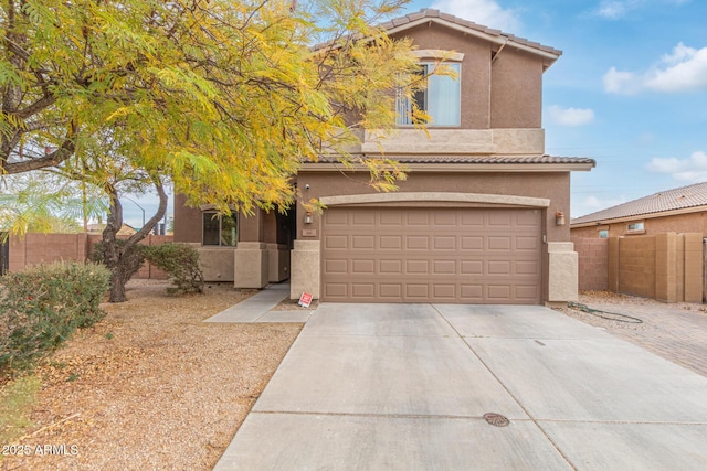 900 W Broadway Ave Unit 66, Apache Junction, AZ 85120 - view of front of house with a tiled roof, fence, driveway, and stucco siding