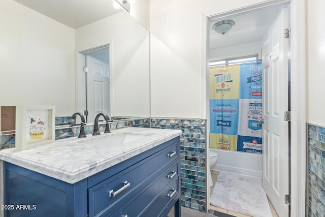 full bath with vanity, toilet, and shower / bath combination