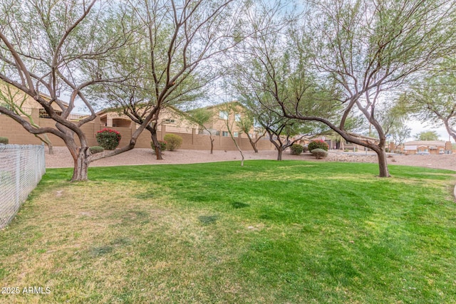 view of yard with fence