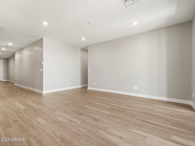 17809 W Elm St, Goodyear, AZ 85395 - empty room with light wood-type flooring, baseboards, and recessed lighting