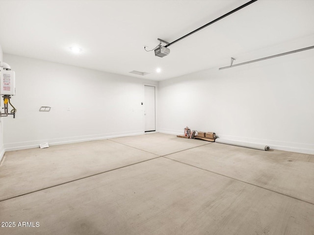 17809 W Elm St, Goodyear, AZ 85395 - garage featuring a garage door opener, baseboards, and recessed lighting