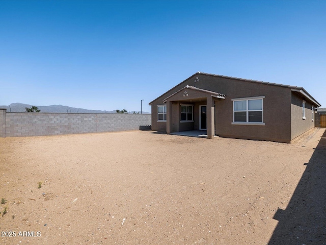 17809 W Elm St, Goodyear, AZ 85395 - back of house with a fenced backyard and a patio