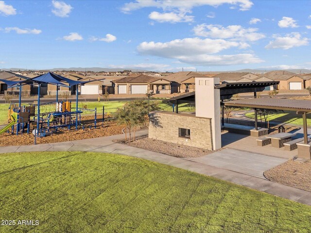 17809 W Elm St, Goodyear, AZ 85395 - view of green lawn featuring a residential view