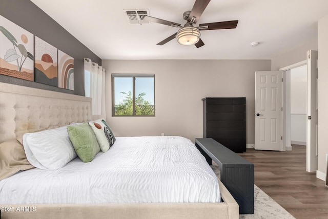 40807 N Barnum Way, Anthem, AZ 85086 - bedroom featuring wood finished floors, baseboards, and ceiling fan