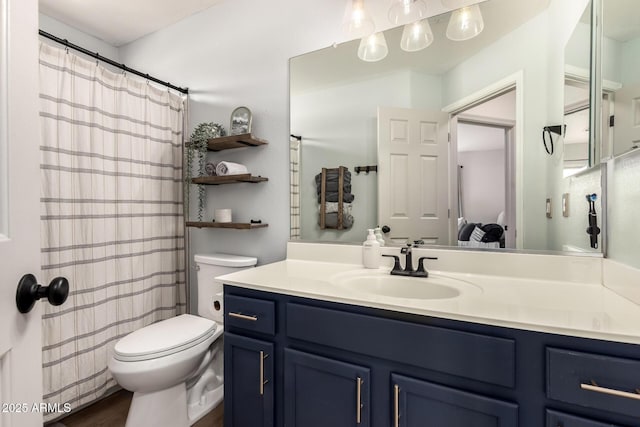 40807 N Barnum Way, Anthem, AZ 85086 - bathroom with toilet, vanity, and wood finished floors