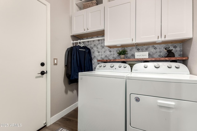 40807 N Barnum Way, Anthem, AZ 85086 - laundry room featuring washing machine and clothes dryer, cabinet space, baseboards, and wood finished floors