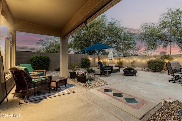 40807 N Barnum Way, Anthem, AZ 85086 - fenced backyard with an outdoor fire pit and a patio area